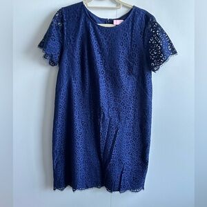 Blue lace cocktail dress with scalloped sleeves and bottom